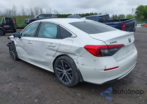 2022 Honda Civic Touring from USA, damaged, VIN 2HGFE1F9XNH306361